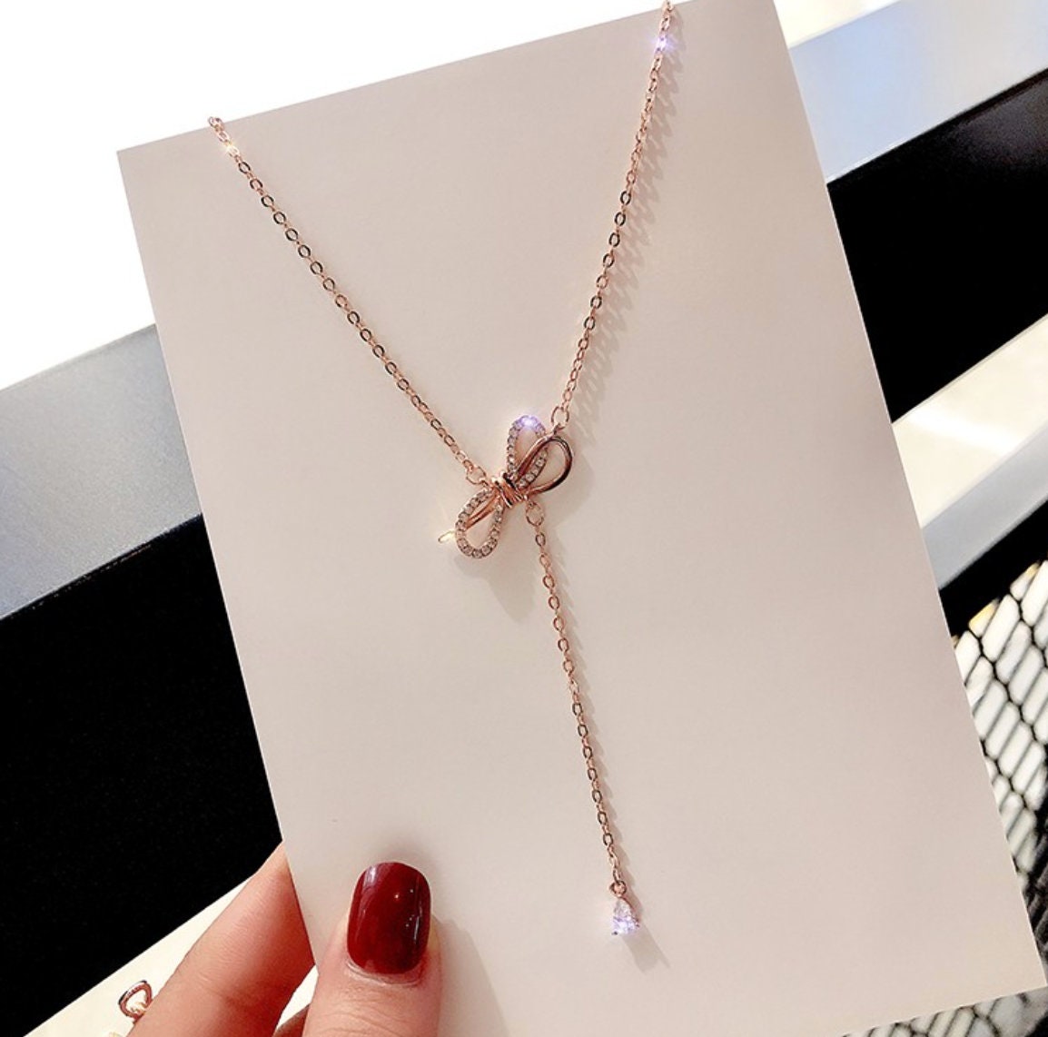 Elegant CZ Ribbon Necklace