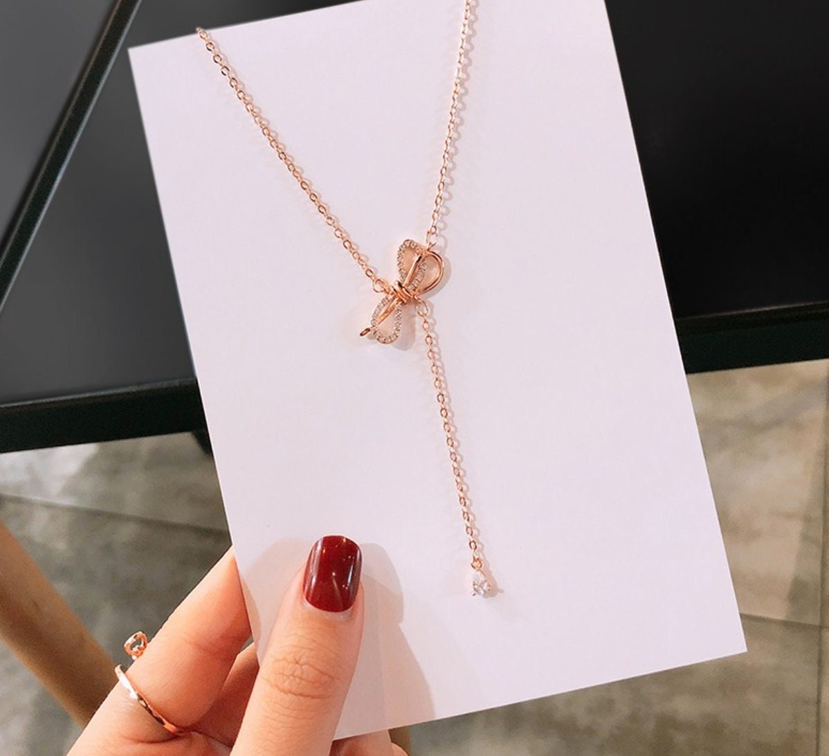 Elegant CZ Ribbon Necklace