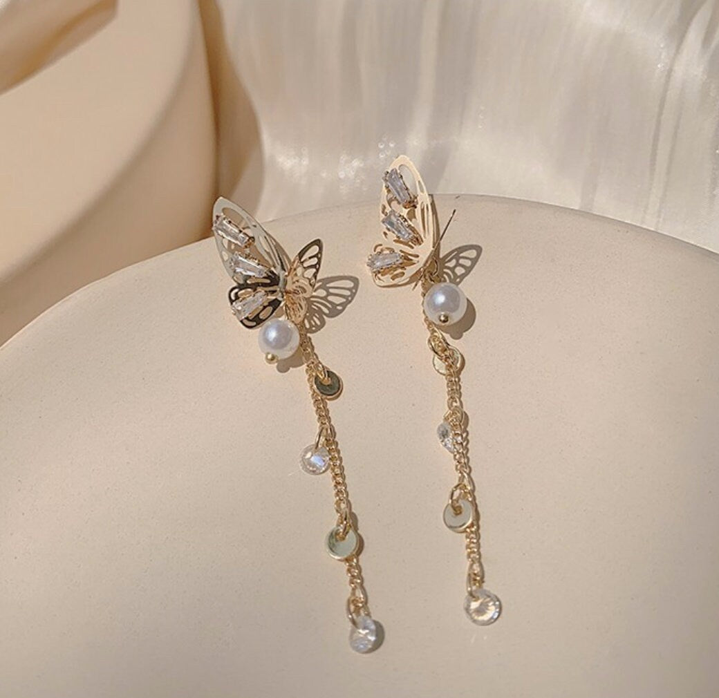 Pearl butterfly dangle earrings