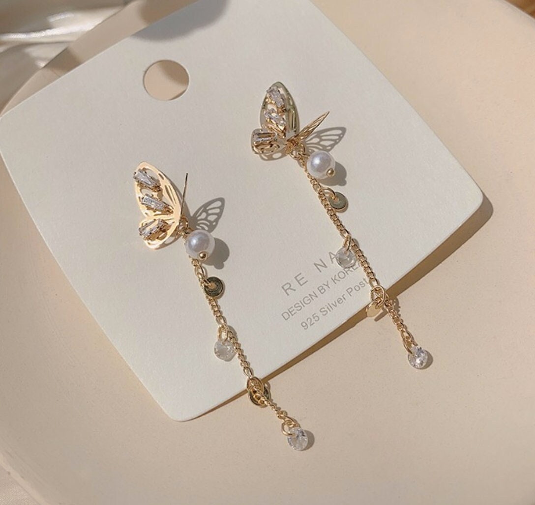 Pearl butterfly dangle earrings