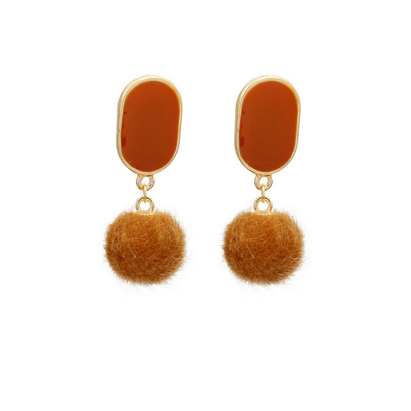 Classic brown pom pom earrings